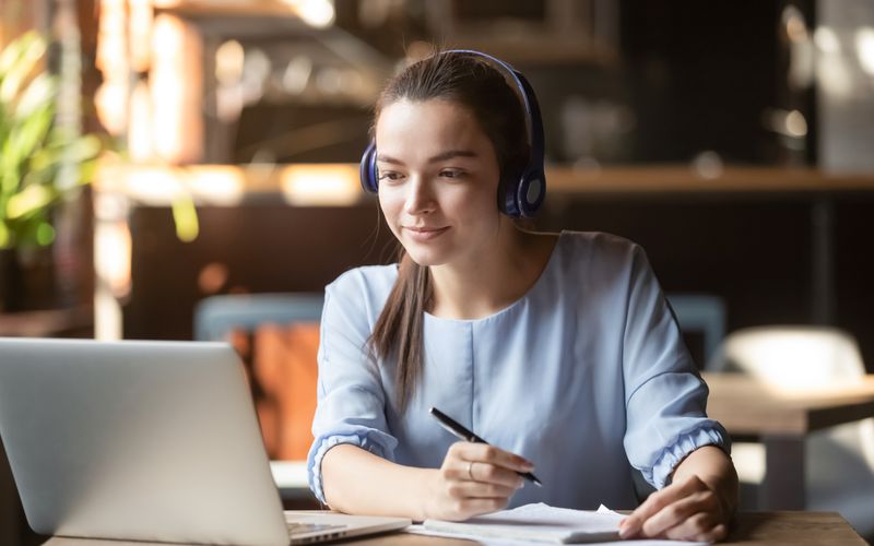 girl behind laptop