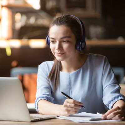 girl behind laptop